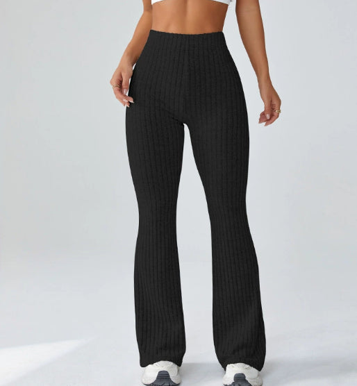 Ribbed flare yoga pants in black, front view
