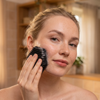 Model using the Black Silicone Face Scrubber (UGC)